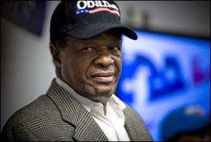 Marion Barry wearing an Obama for president cap.